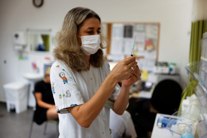 2021-06-22t095316z-368951677-rc2z4o97btds-rtrmadp-3-health-coronavirus-israel-scaled