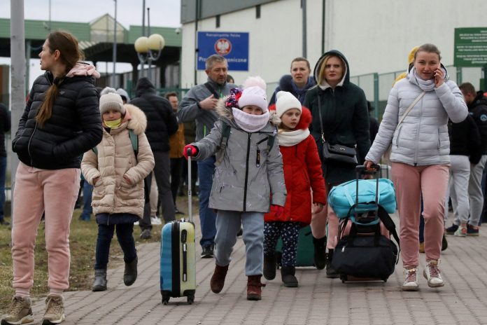 2022-02-25t204143z-626821751-rc2vqs93qffx-rtrmadp-3-ukraine-crisis-usa-immigration-scaled
