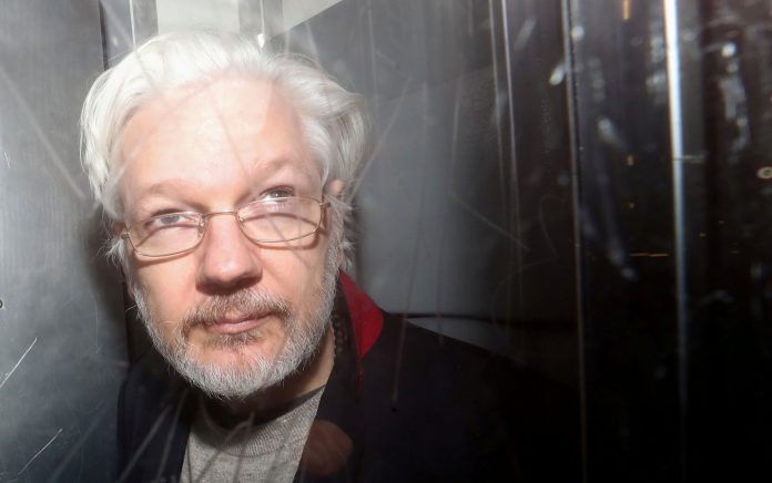 2020-02-19t163558z-1662544542-rc2s3f9lstl4-rtrmadp-3-britain-assange