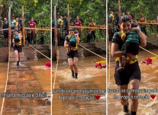 Vídeo de mãe atravessando ponte com filha no colo durante prova de corrida viraliza e divide opiniões na internet